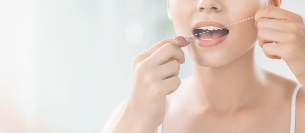 young woman taking dental health seriously